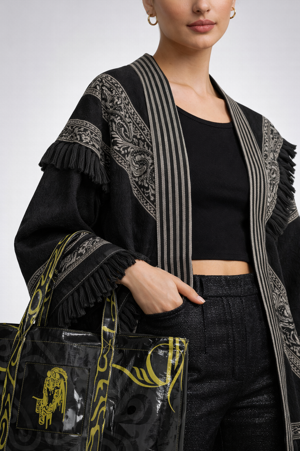 Campaign detail — embroidered open abaya with branded tote bag
