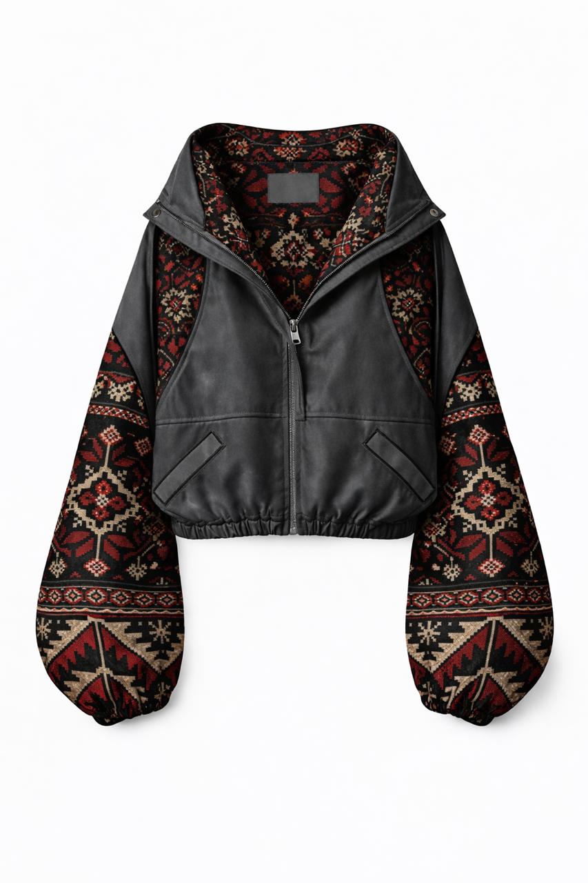 Embroidered leather jacket with patterned knit sleeves